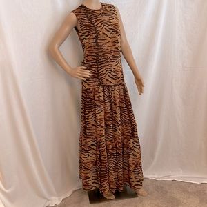 One of a kind shell in animal print polyester chiffon.